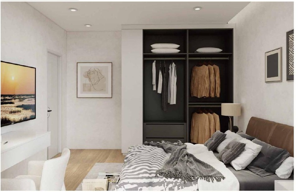 Open fitted wardrobe with drawers and hanging storage